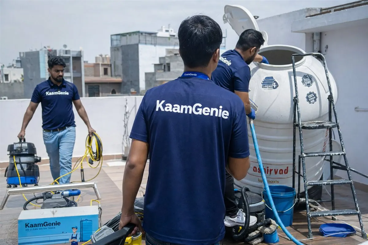 KaamGenie crew arriving fast to clean a contaminated overhead water tank on a Delhi rooftop for a same-day emergency booking
