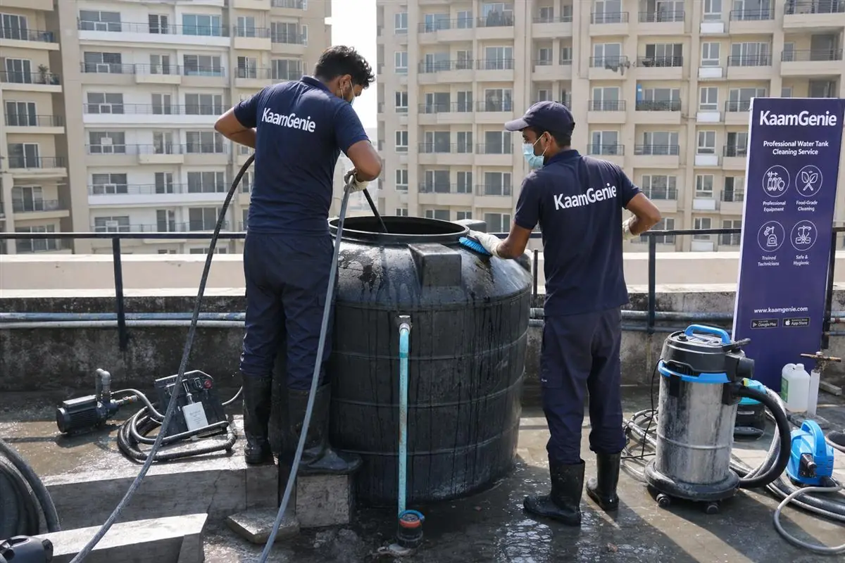 KaamGenie society & rwa water tank cleaning crew arriving at a Delhi home, same-day near-you service