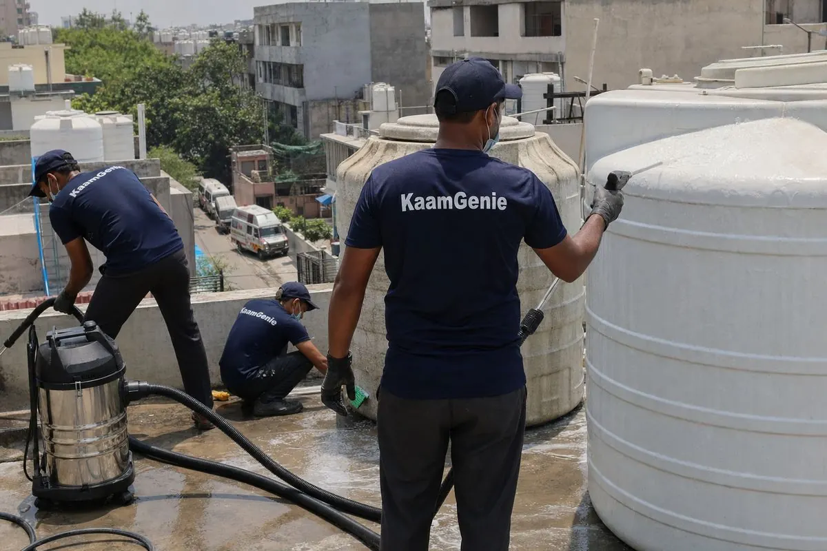 KaamGenie crew cleaning a commercial water tank in Sarita Vihar, Delhi