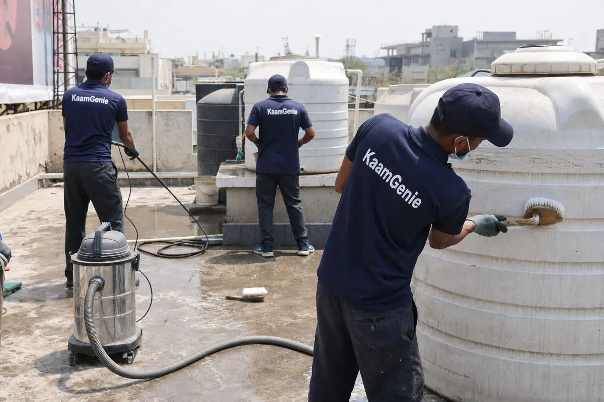 KaamGenie crew cleaning a commercial water tank in Vasant Vihar, Delhi