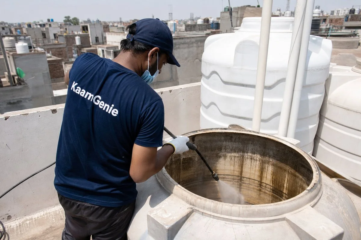 KaamGenie crew cleaning a overhead (rooftop) tank in Sant Nagar (Burari), Delhi