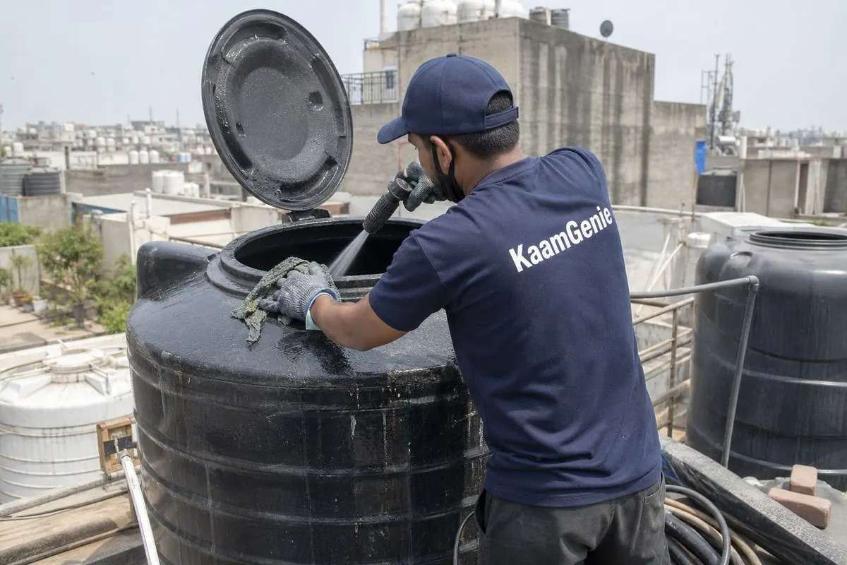 KaamGenie crew cleaning a Sintex / plastic tank in Amar Colony, Delhi