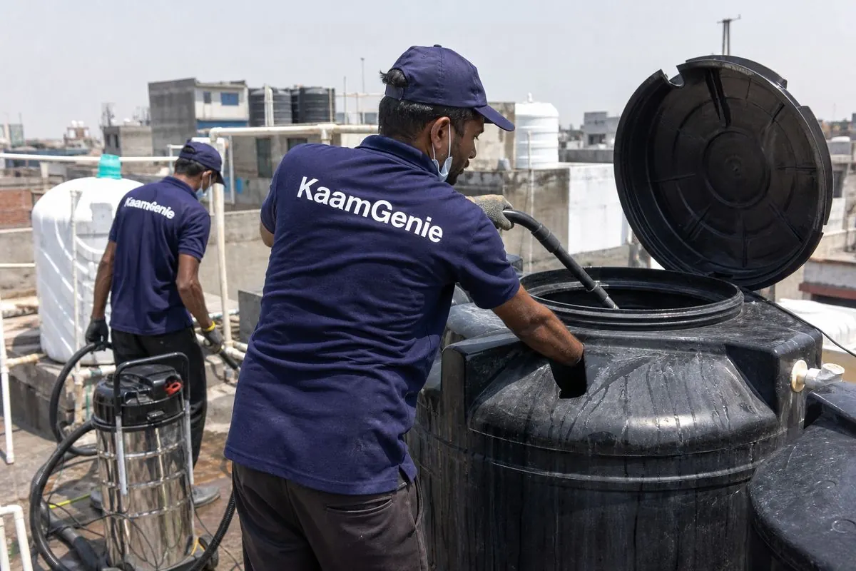 KaamGenie crew cleaning a Sintex / plastic tank in Azadpur, Delhi
