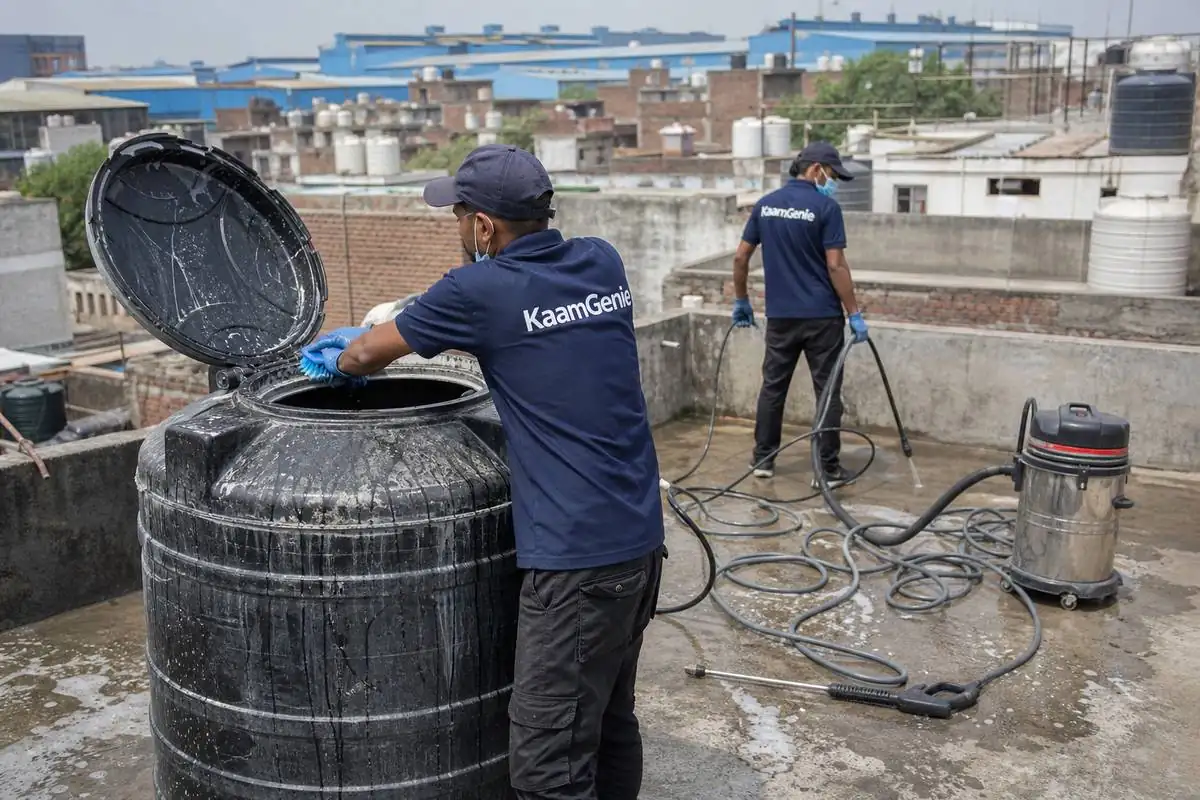 KaamGenie crew cleaning a Sintex / plastic tank in Badli, Delhi
