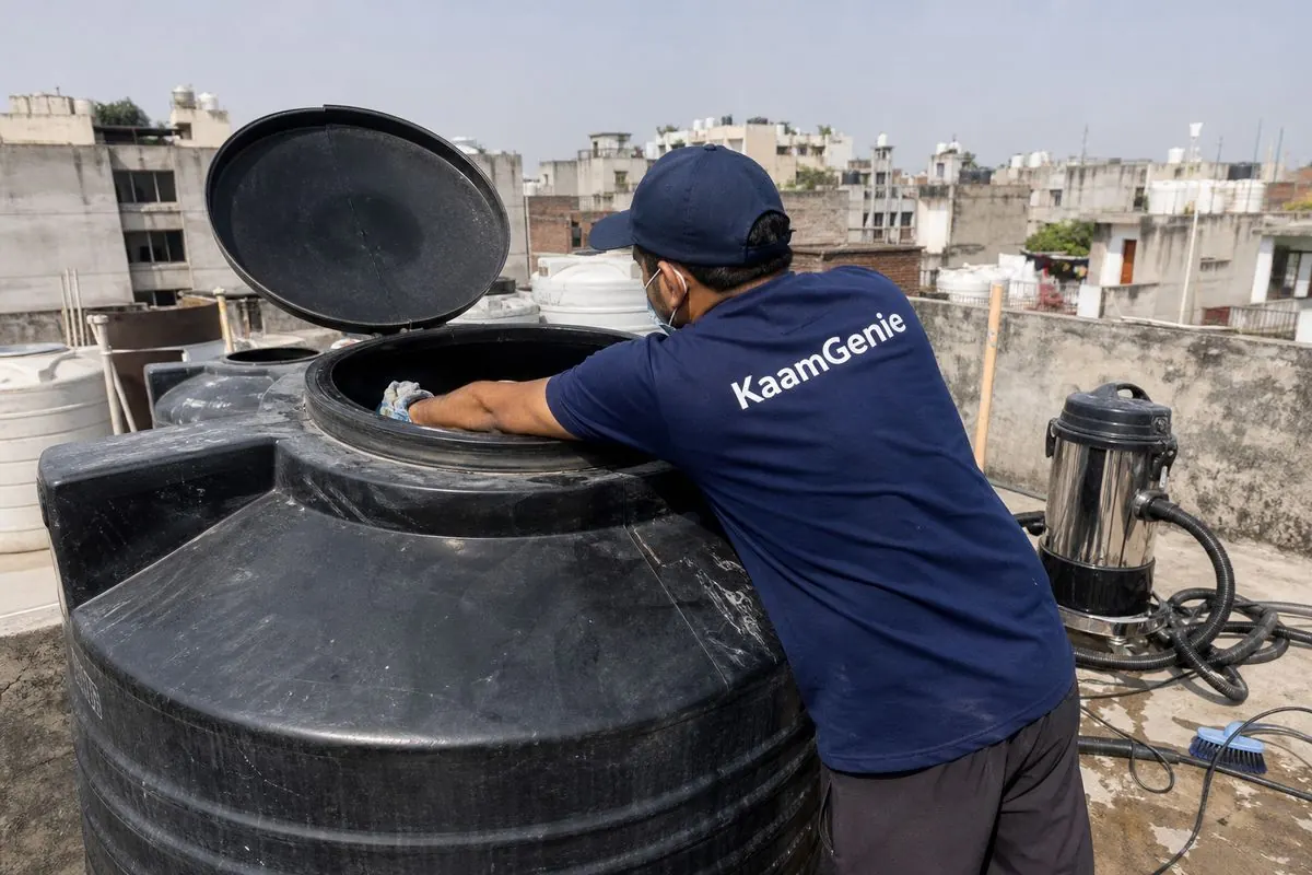 KaamGenie crew cleaning a Sintex / plastic tank in Bindapur, Delhi