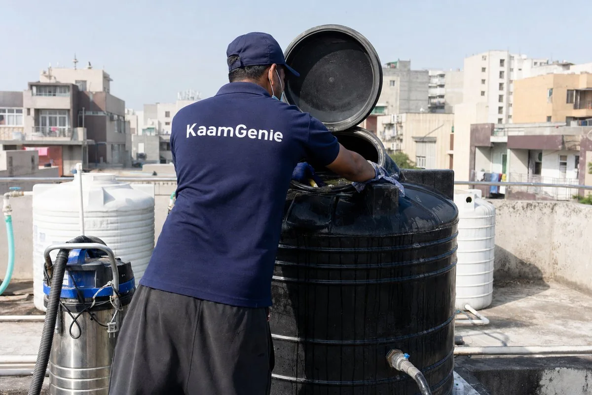 KaamGenie crew cleaning a Sintex / plastic tank in Dwarka Sector 12, Delhi