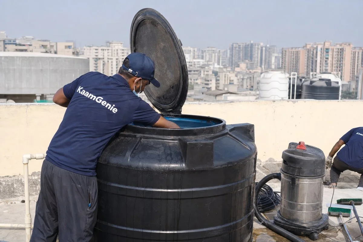 KaamGenie crew cleaning a Sintex / plastic tank in Dwarka Sector 18, Delhi