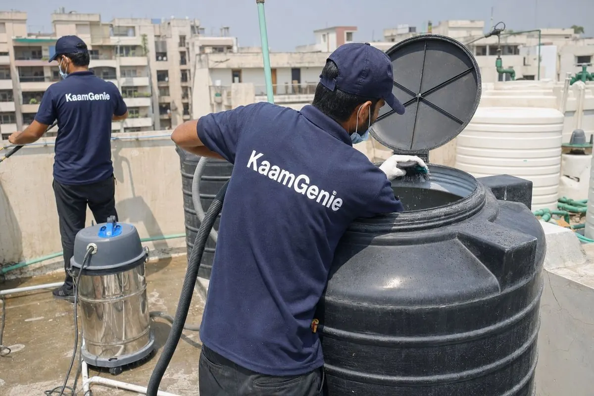 KaamGenie crew cleaning a Sintex / plastic tank in Dwarka Sector 20, Delhi