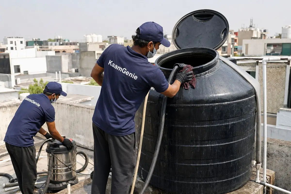 KaamGenie crew cleaning a Sintex / plastic tank in Dwarka Sector 28, Delhi