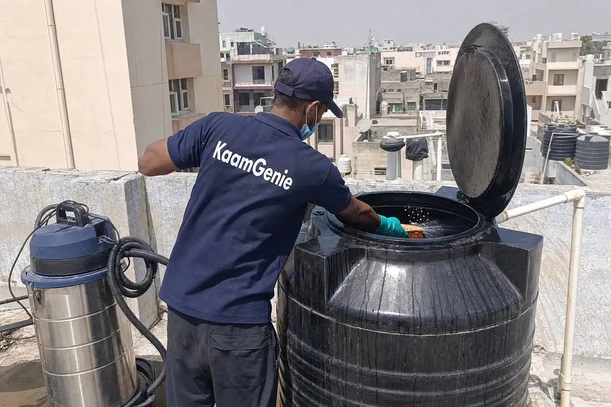 KaamGenie crew cleaning a Sintex / plastic tank in Dwarka Sector 29, Delhi
