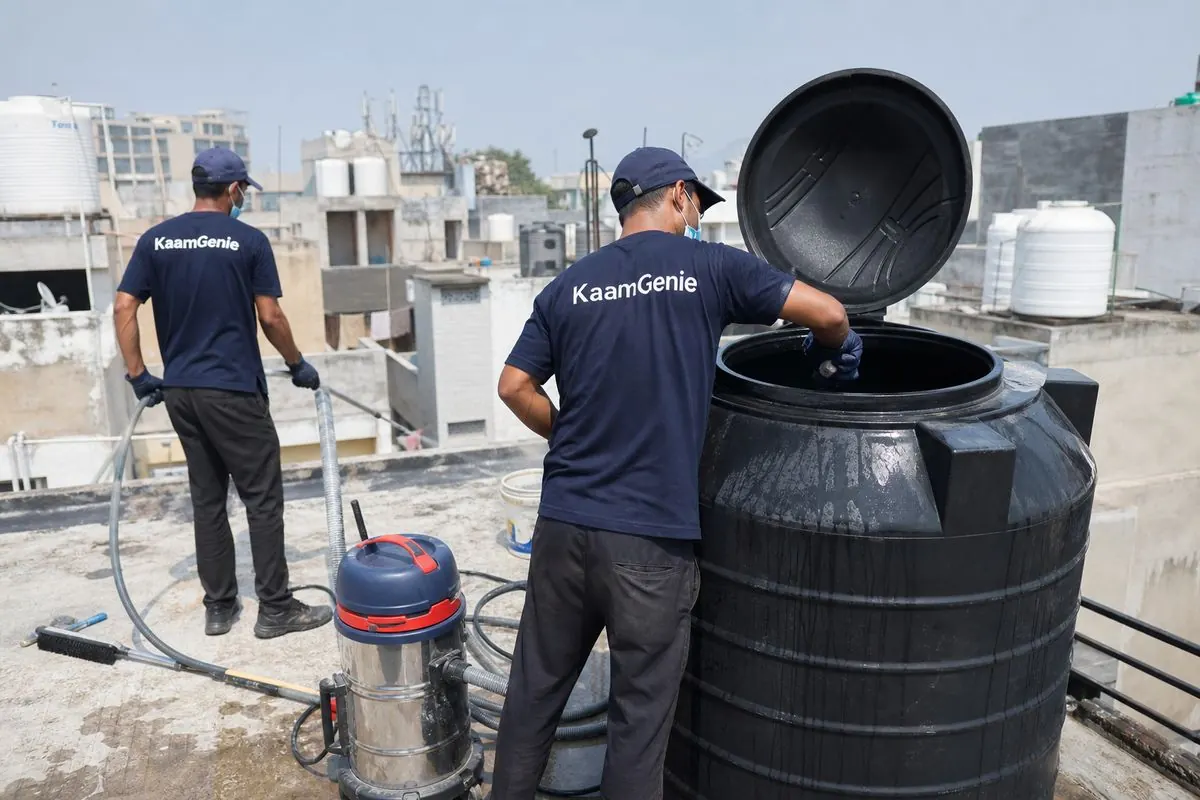 KaamGenie crew cleaning a Sintex / plastic tank in Jawahar Nagar (Kamla Nagar), Delhi