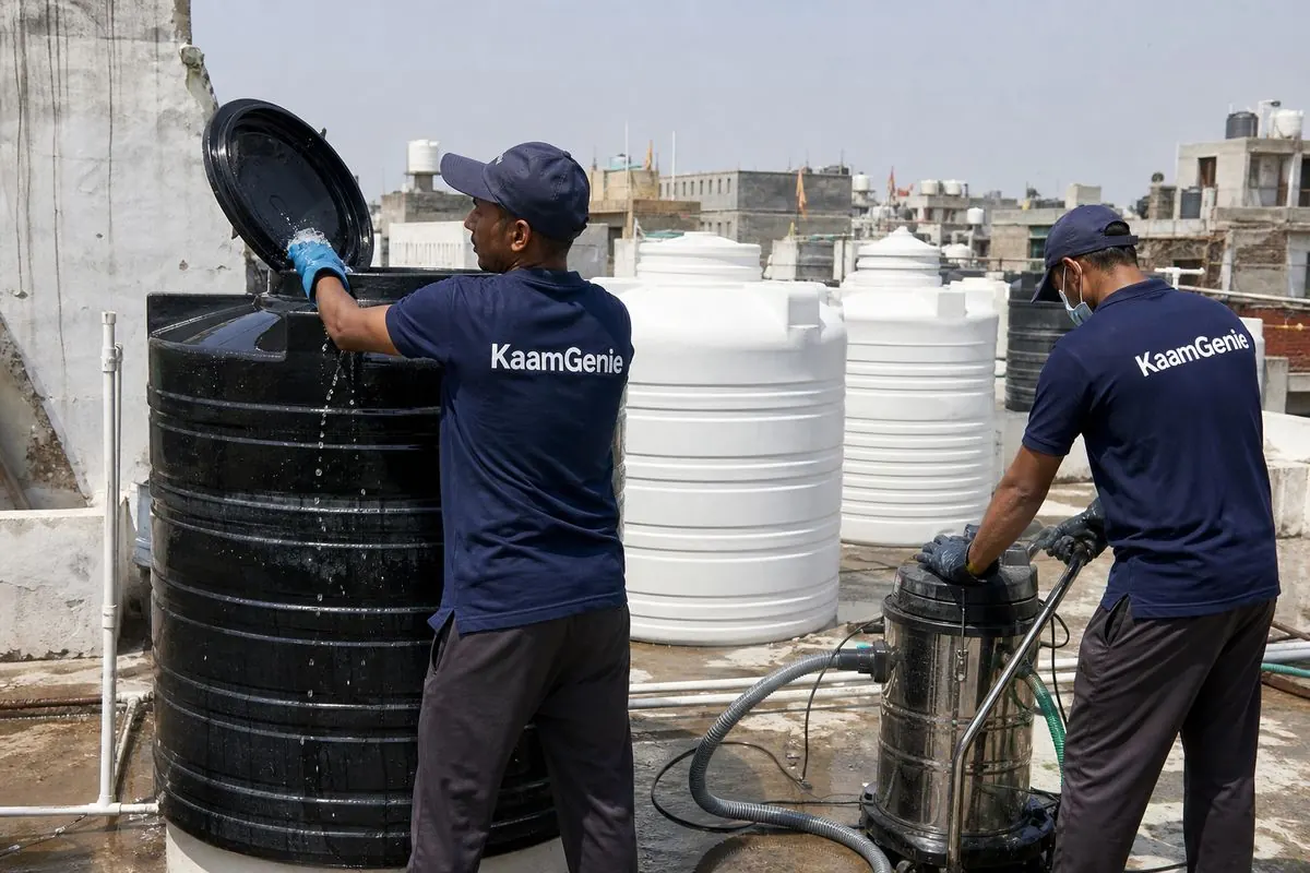 KaamGenie crew cleaning a Sintex / plastic tank in Matiala, Delhi