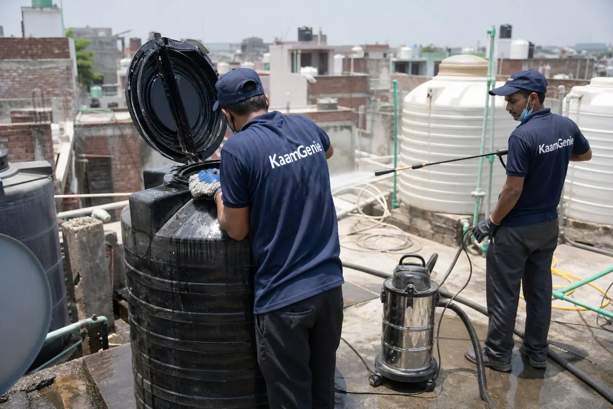 KaamGenie crew cleaning a Sintex / plastic tank in Rajgarh Colony, Delhi