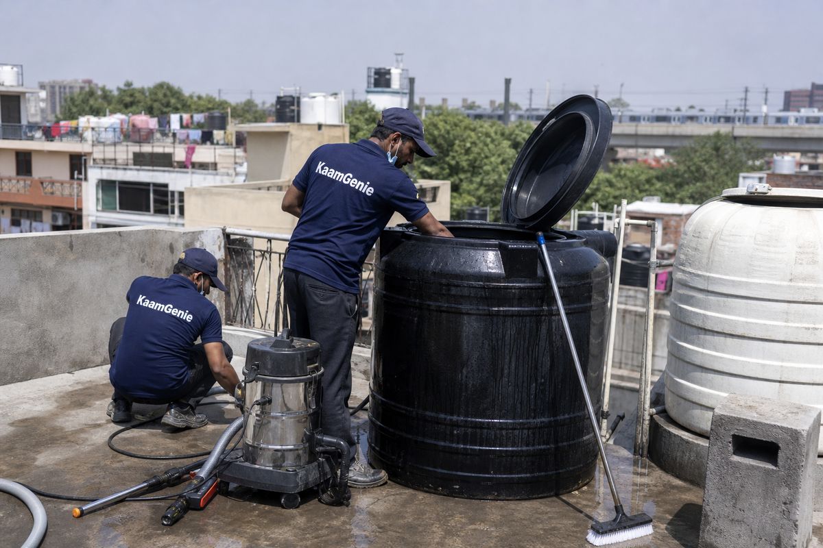 KaamGenie crew cleaning a Sintex / plastic tank in Tagore Garden, Delhi