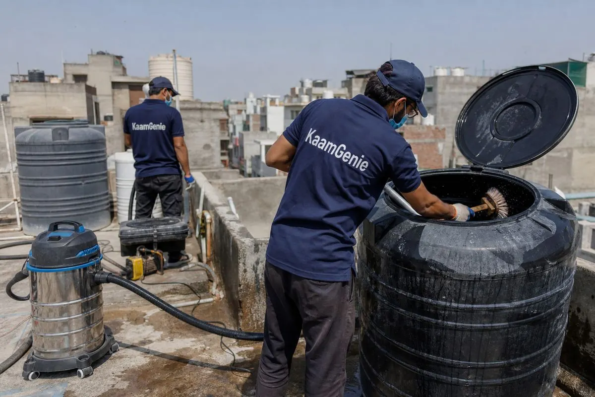 KaamGenie crew cleaning a Sintex / plastic tank in Timarpur, Delhi