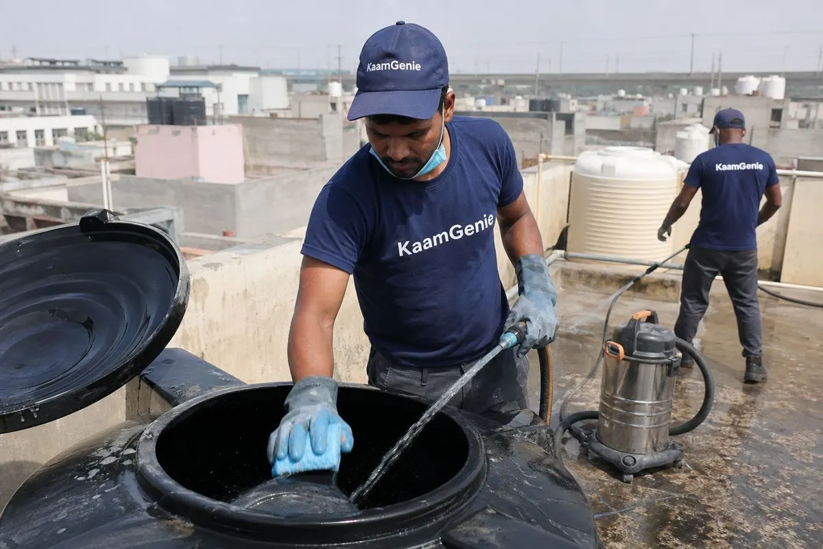KaamGenie crew cleaning a Sintex / plastic tank in Uttam Nagar, Delhi