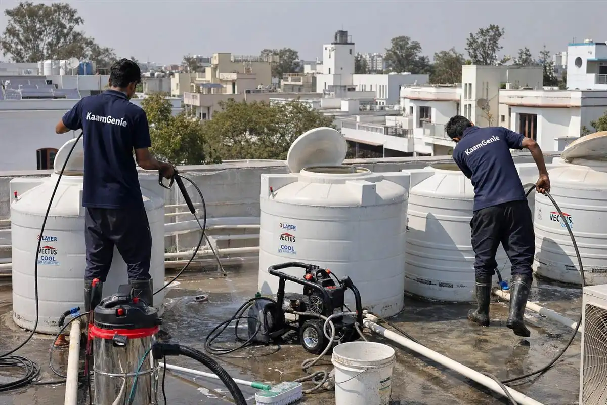 KaamGenie crew cleaning a society water tank in Anand Niketan, Delhi