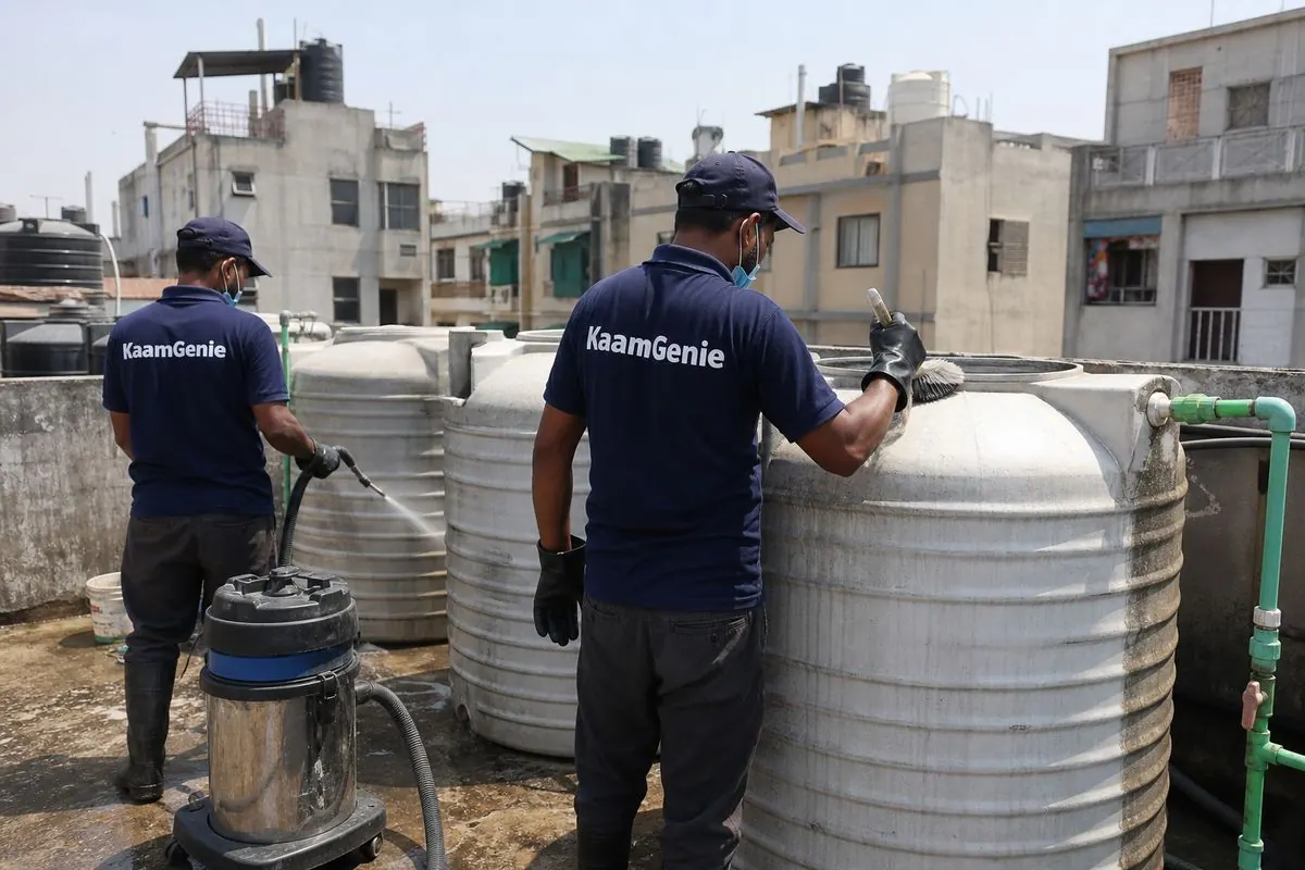 KaamGenie crew cleaning a society water tank in Ashok Vihar, Delhi