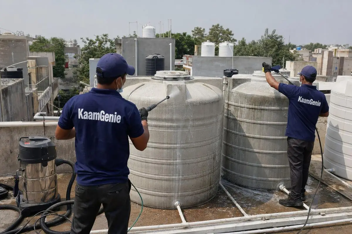 KaamGenie crew cleaning a society water tank in Delhi Cantt, Delhi