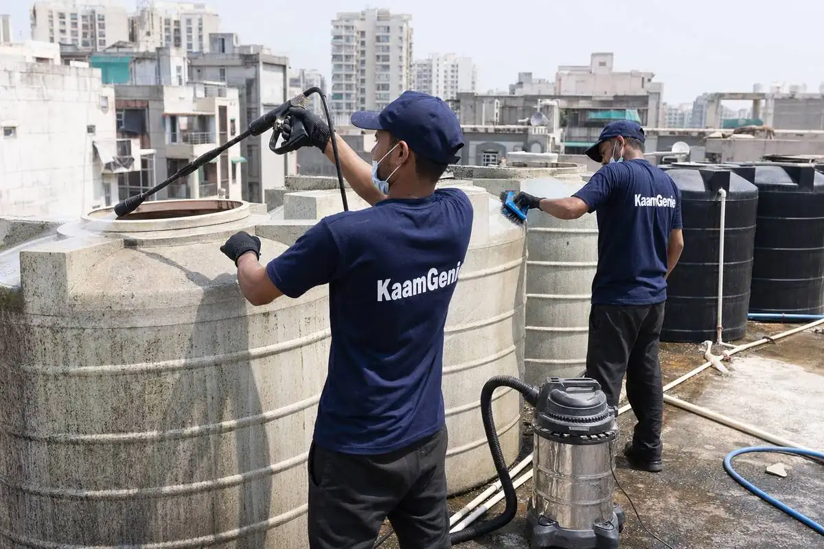 KaamGenie crew cleaning a society water tank in Dwarka Sector 25, Delhi