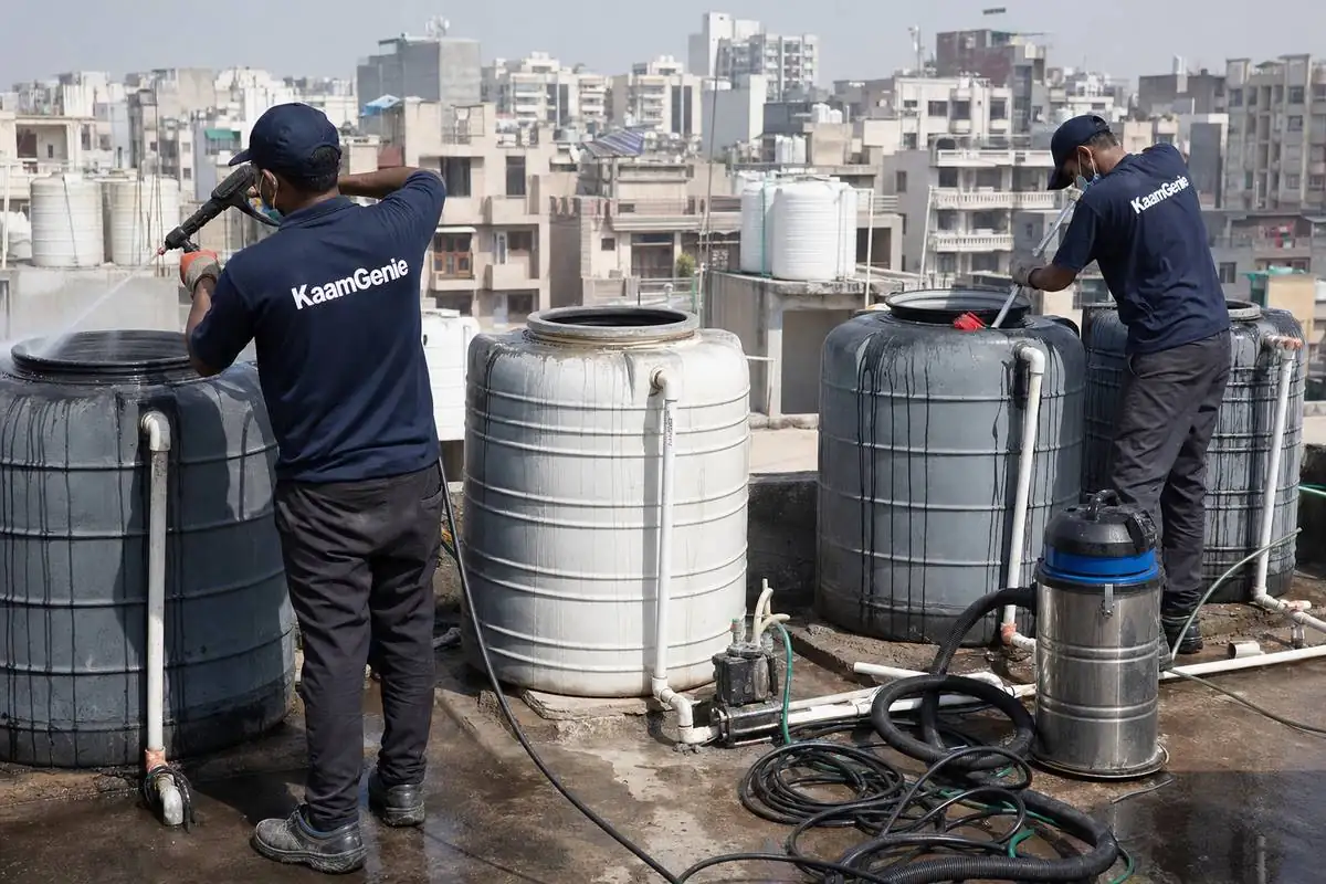 KaamGenie crew cleaning a society water tank in Dwarka Sector 27, Delhi