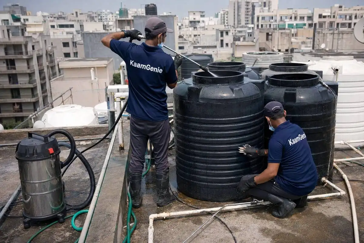 KaamGenie crew cleaning a society water tank in Dwarka Sector 8, Delhi