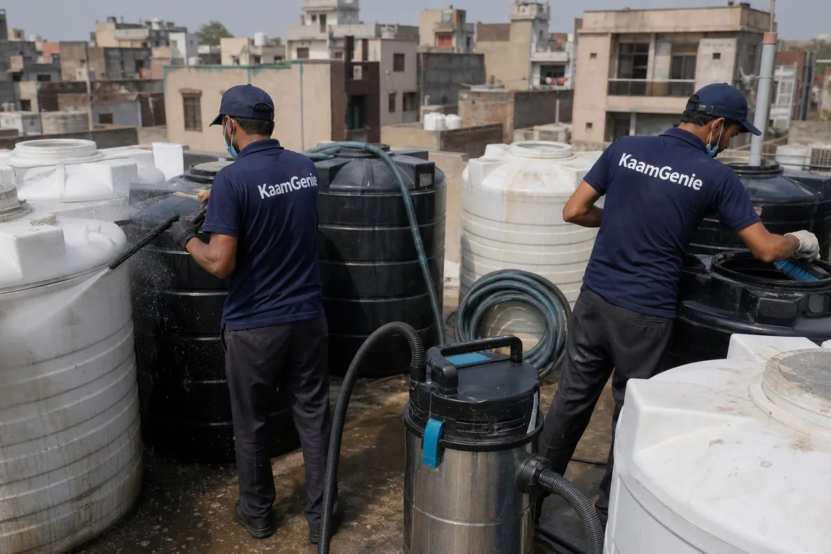KaamGenie crew cleaning a society water tank in Fateh Nagar, Delhi