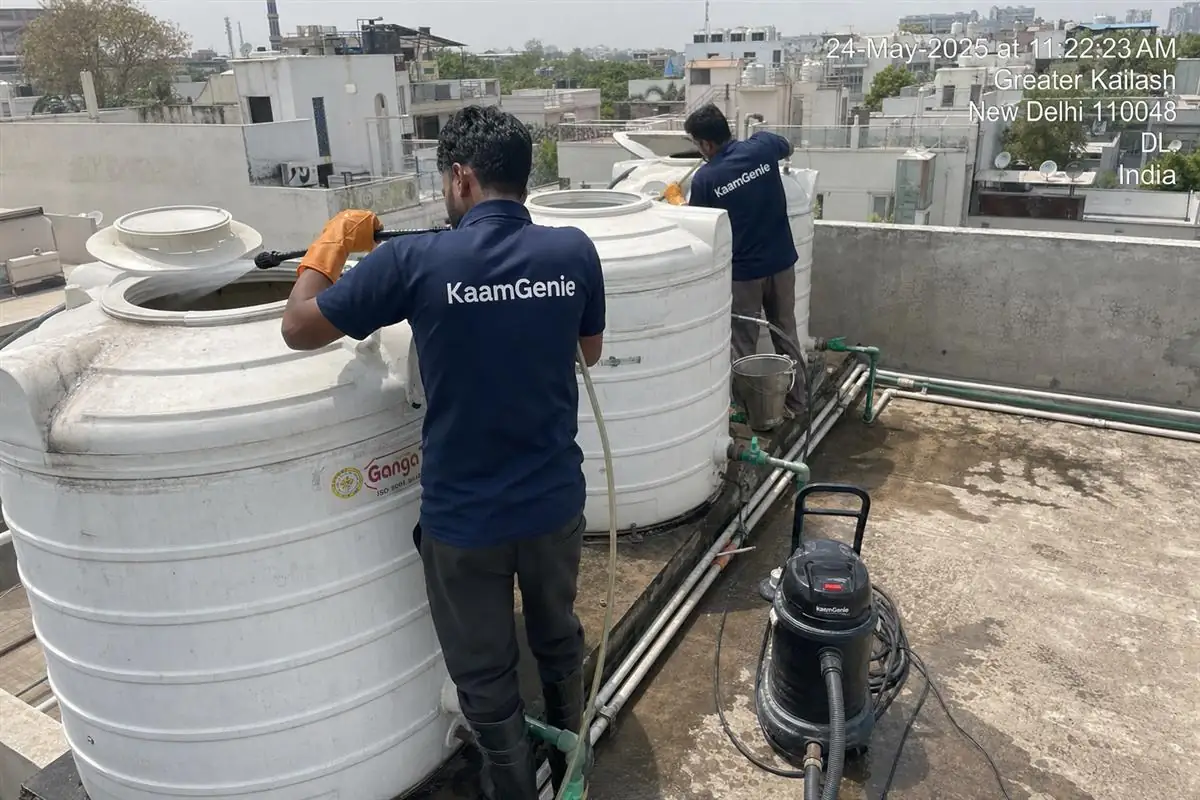 KaamGenie crew cleaning a society water tank in Greater Kailash, Delhi