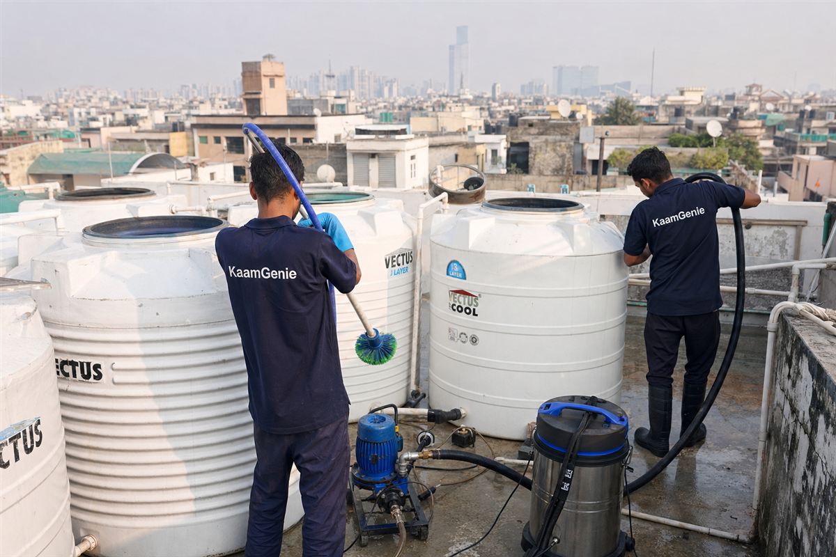 KaamGenie crew cleaning a society water tank in Green Park, Delhi