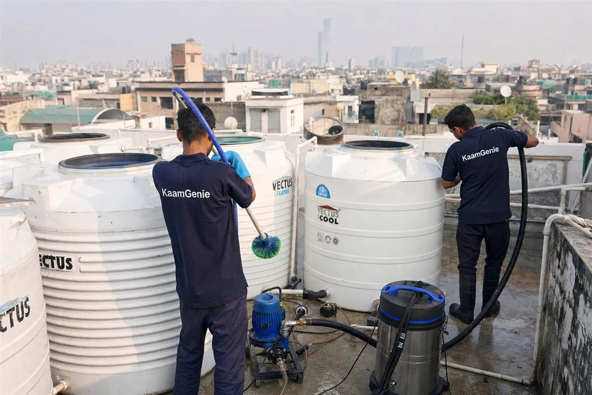 KaamGenie crew cleaning a society water tank in Green Park, Delhi