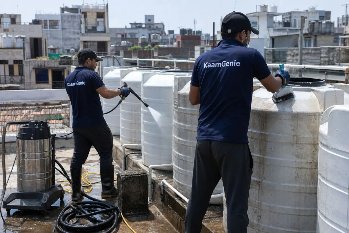 KaamGenie crew cleaning a society water tank in GTB Nagar, Delhi