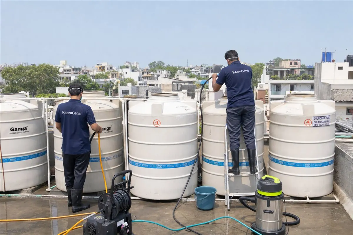 KaamGenie crew cleaning a society water tank in Gulmohar Park, Delhi