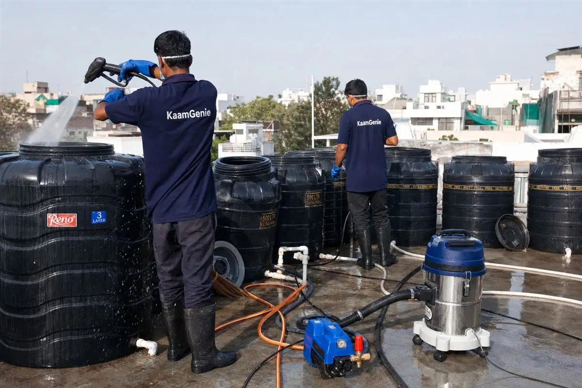 KaamGenie crew cleaning a society water tank in Kailash Colony, Delhi