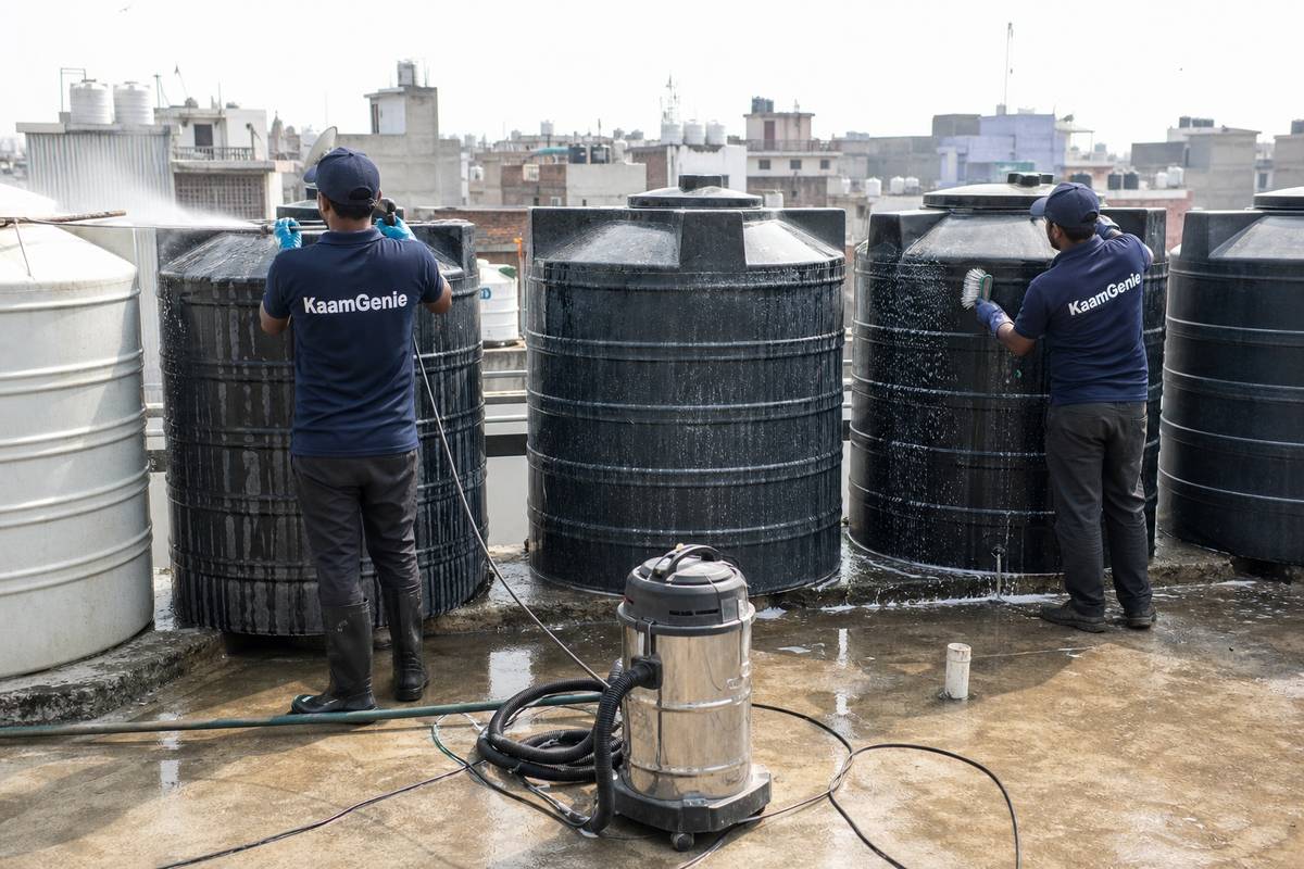KaamGenie crew cleaning a society water tank in Kalyanvas, Delhi