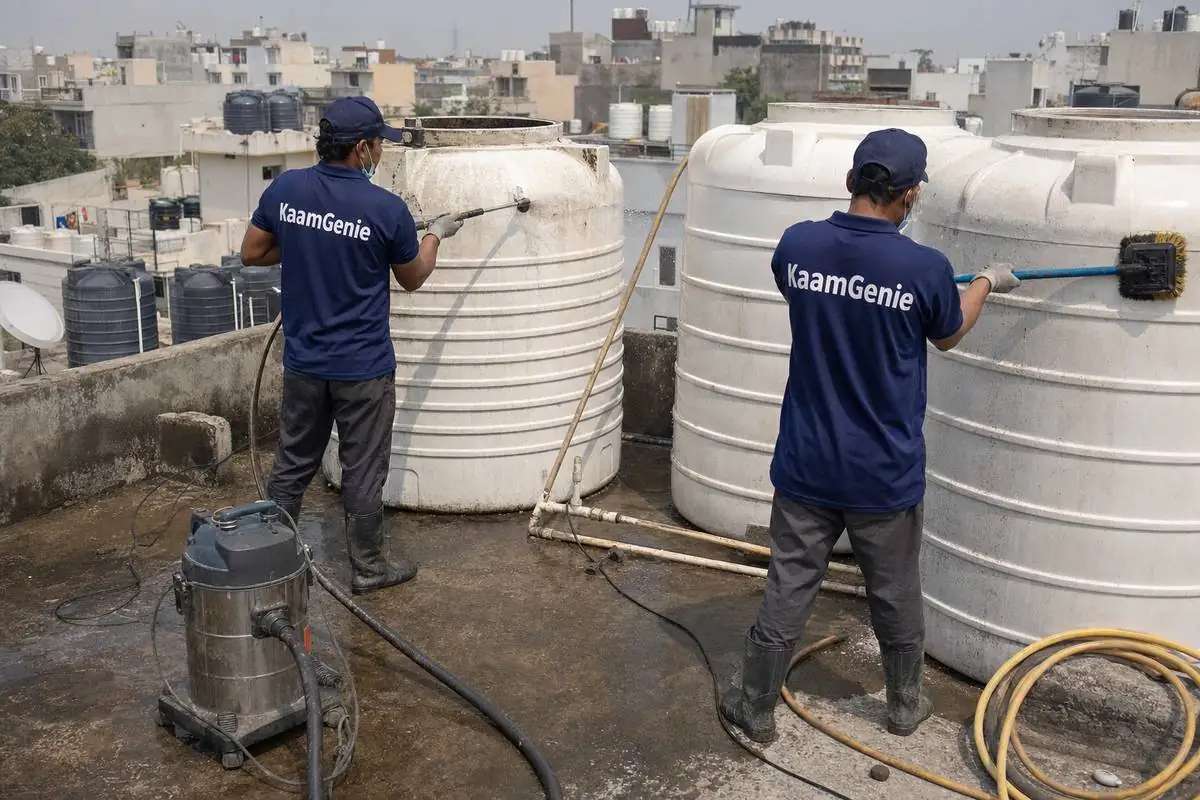 KaamGenie crew cleaning a society water tank in Kapashera, Delhi