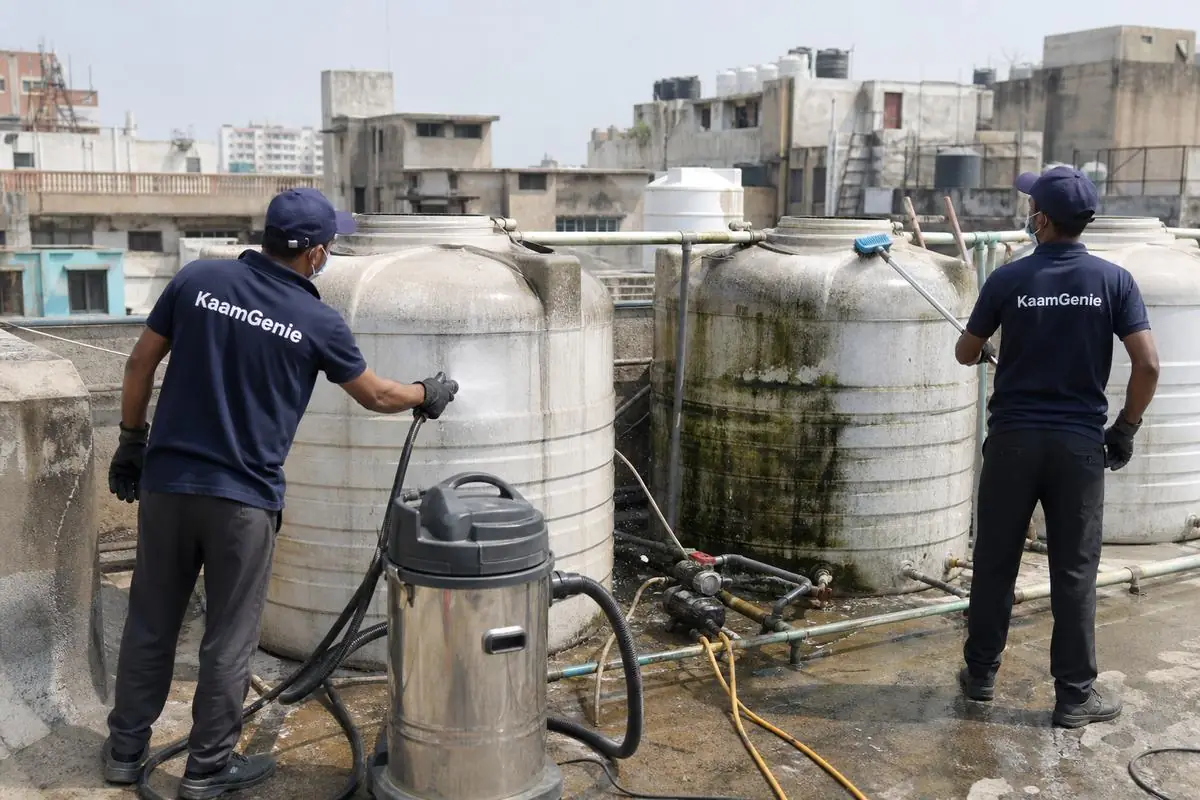 KaamGenie crew cleaning a society water tank in Kingsway Camp, Delhi