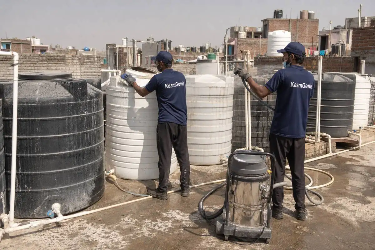 KaamGenie crew cleaning a society water tank in Madipur, Delhi