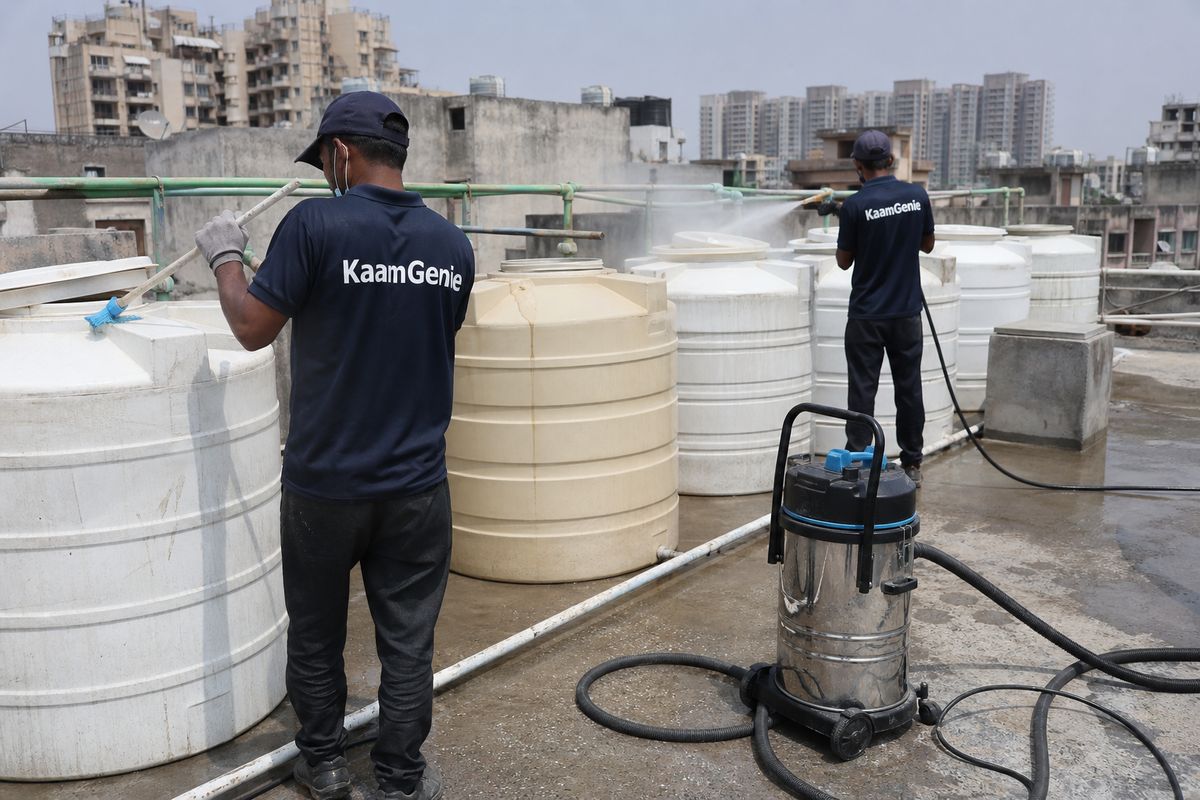 KaamGenie crew cleaning a society water tank in Mayur Vihar Phase 3, Delhi