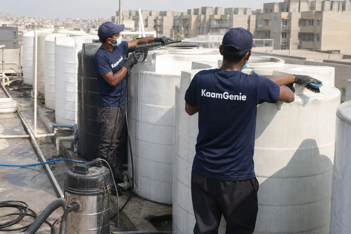 KaamGenie crew cleaning a society water tank in Narela, Delhi