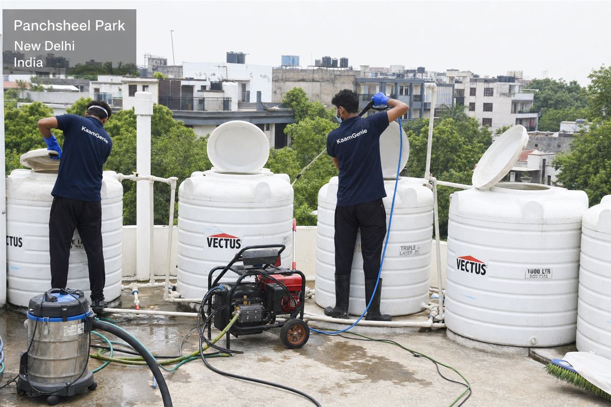 KaamGenie crew cleaning a society water tank in Panchsheel Park, Delhi