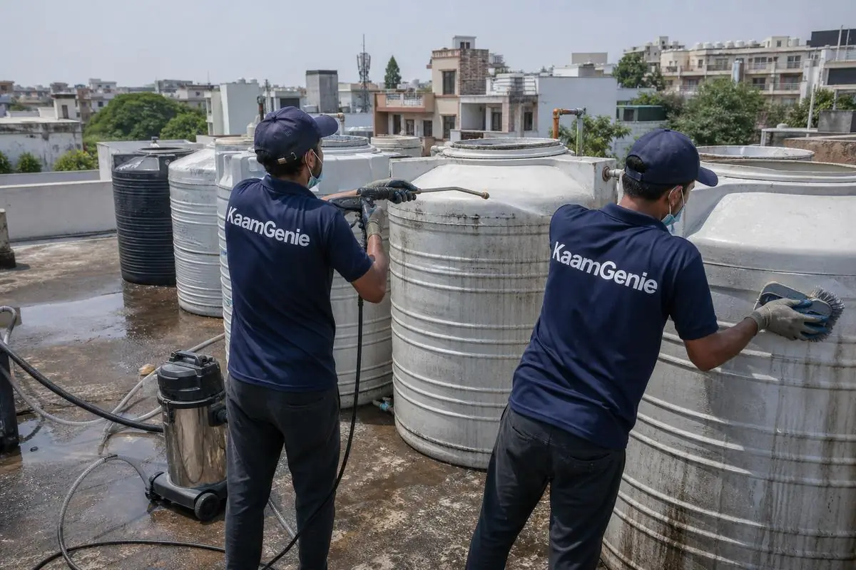 KaamGenie crew cleaning a society water tank in Prashant Vihar, Delhi