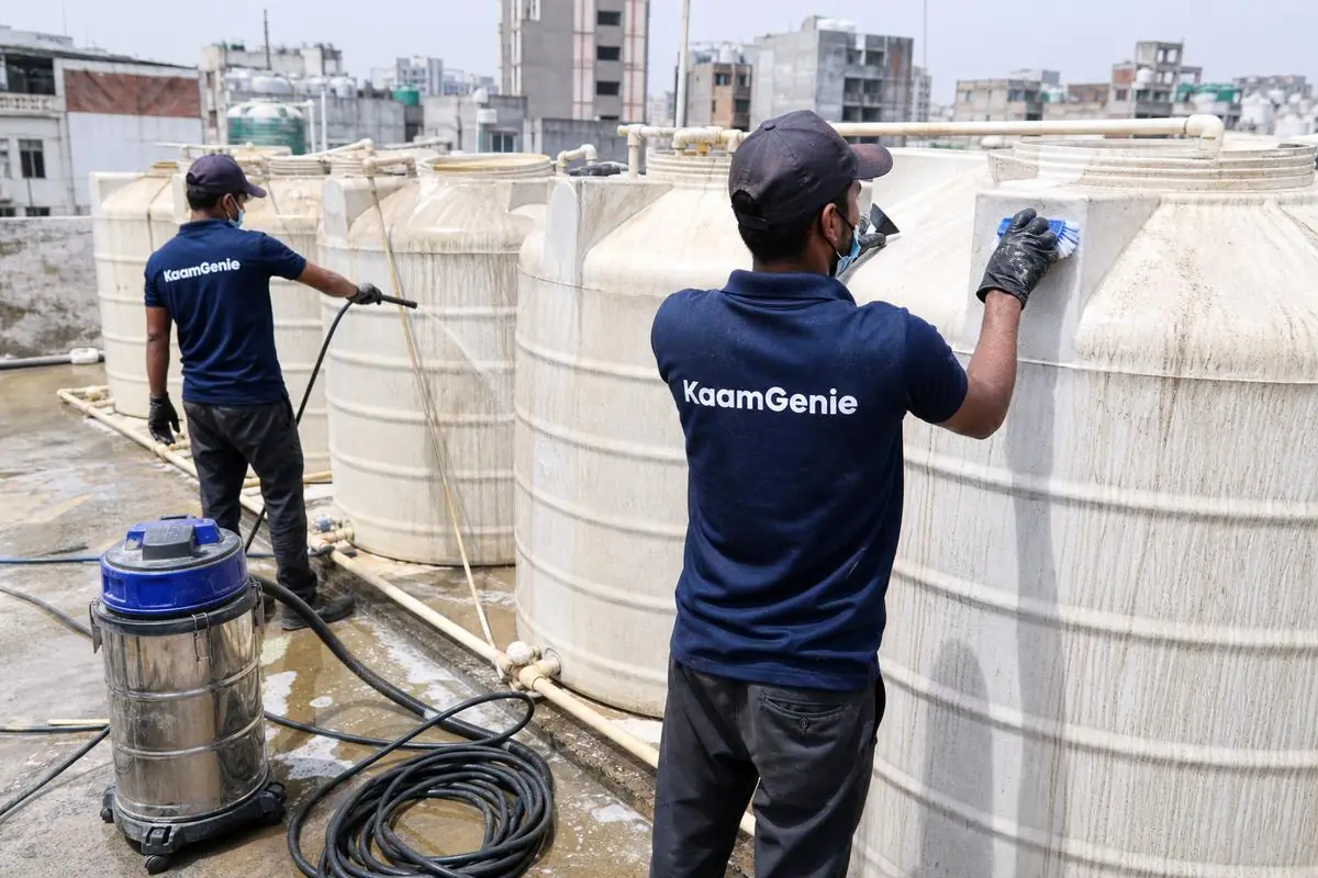 KaamGenie crew cleaning a society water tank in Rajinder Nagar, Delhi