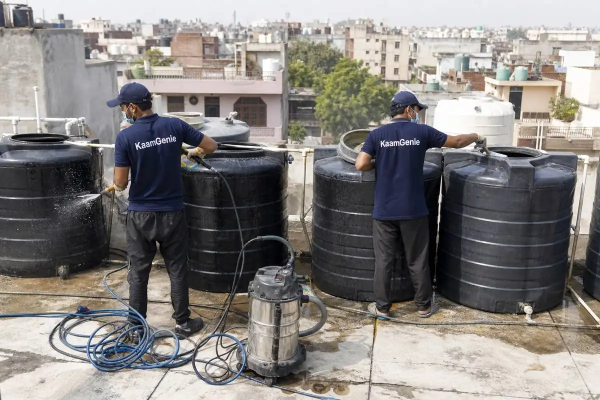 KaamGenie crew cleaning a society water tank in Rana Pratap Bagh, Delhi