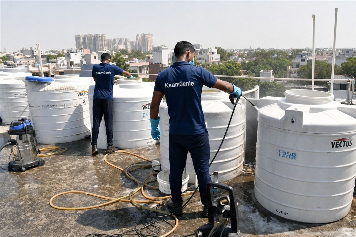 KaamGenie crew cleaning a society water tank in Sarvodaya Enclave, Delhi