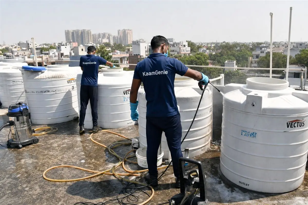 KaamGenie crew cleaning a society water tank in Sarvodaya Enclave, Delhi
