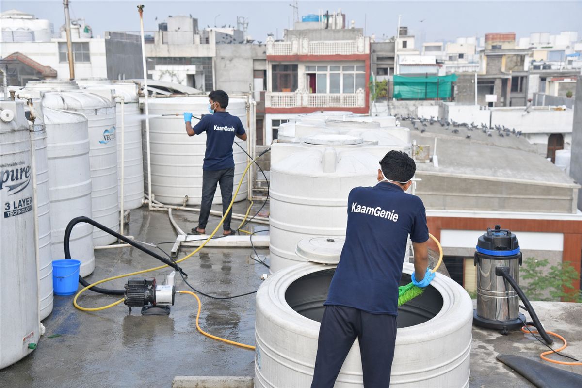 KaamGenie crew cleaning a society water tank in Sukhdev Vihar, Delhi