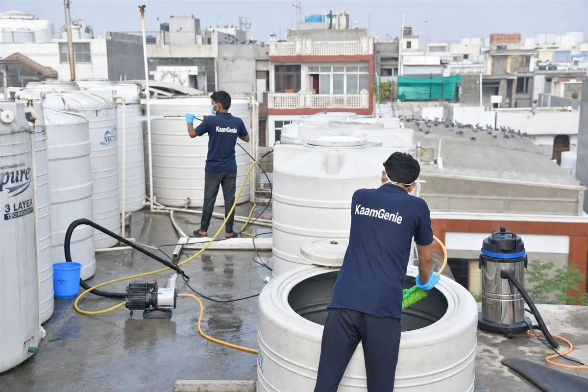 KaamGenie crew cleaning a society water tank in Sukhdev Vihar, Delhi