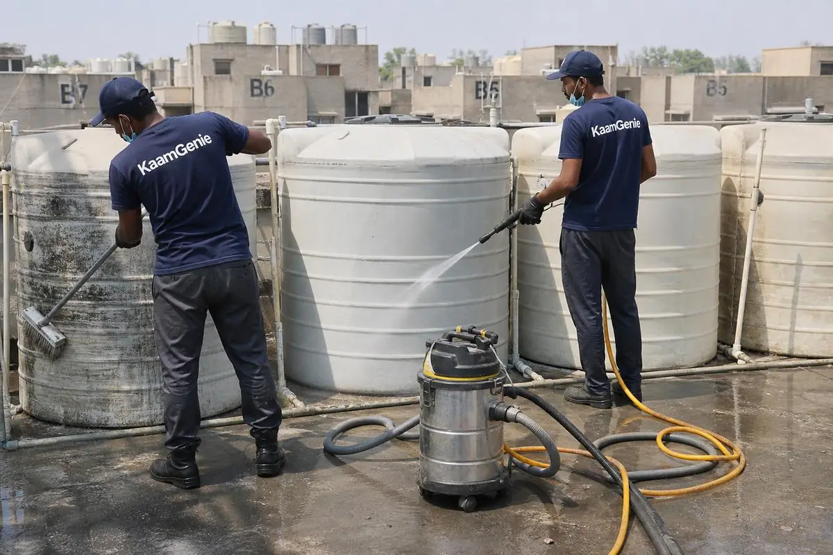 KaamGenie crew cleaning a society water tank in Sultanpuri, Delhi