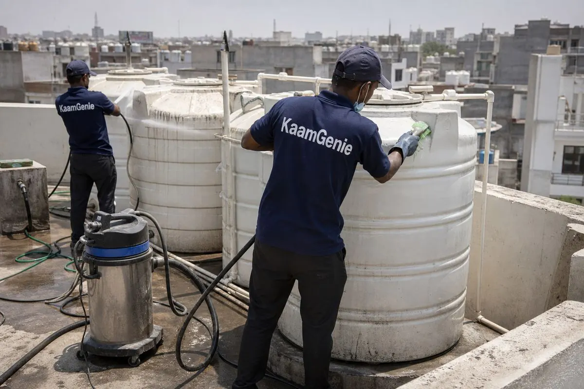 KaamGenie crew cleaning a society water tank in Vikram Vihar, Delhi