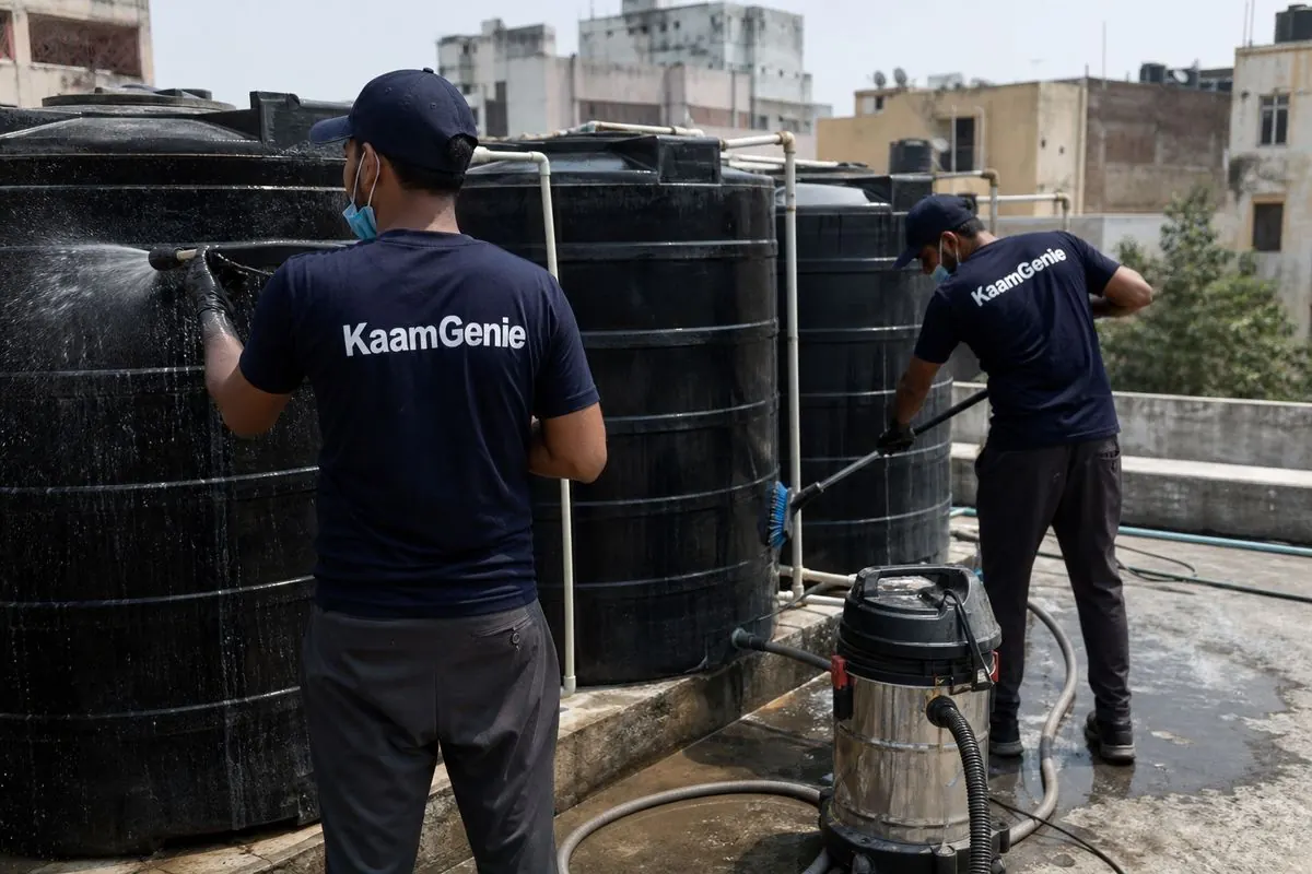 KaamGenie crew cleaning a society water tank in Yamuna Vihar, Delhi